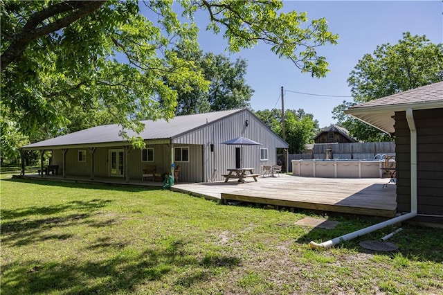 3931 Main St, Parsons, KS 67357 - back of house featuring a wooden deck