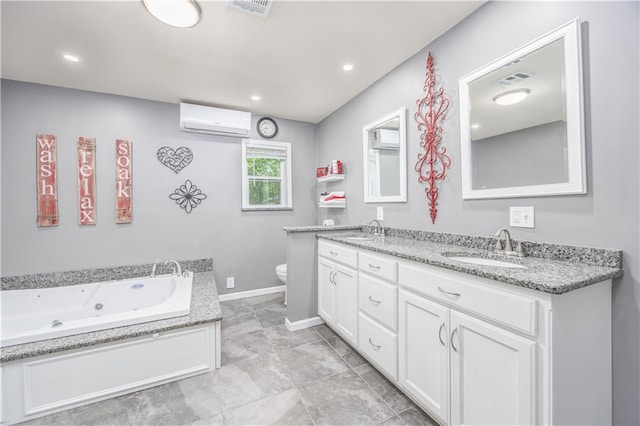 3931 Main St, Parsons, KS 67357 - full bath featuring an AC wall unit, double vanity, a whirlpool tub, toilet, and baseboards