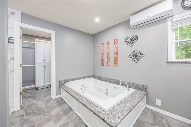 3931 Main St, Parsons, KS 67357 - full bath featuring a wall mounted AC, a jetted tub, and baseboards
