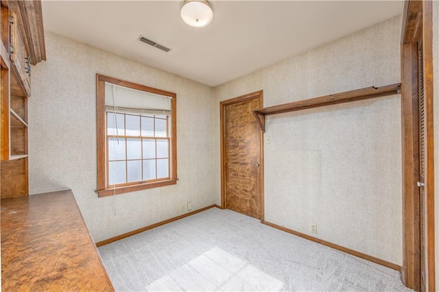 3931 Main St, Parsons, KS 67357 - unfurnished bedroom with carpet flooring and baseboards