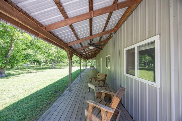 3931 Main St, Parsons, KS 67357 - wooden deck with a yard and a ceiling fan