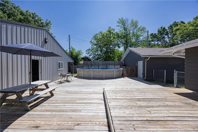 3931 Main St, Parsons, KS 67357 - wooden terrace with outdoor dining space