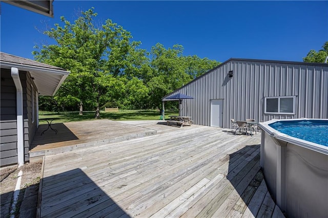 3931 Main St, Parsons, KS 67357 - view of wooden terrace