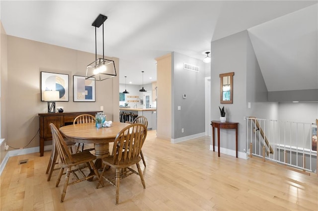 13807 W 47th Ter, Shawnee, KS 66216 - dining area with light wood-style flooring and baseboards