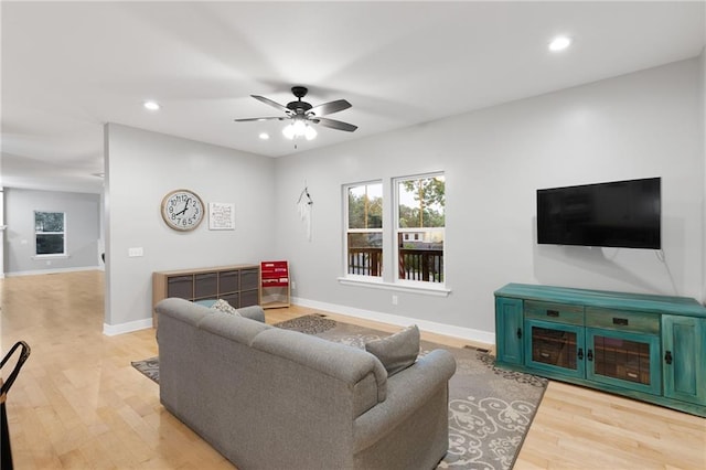 13807 W 47th Ter, Shawnee, KS 66216 - living area featuring recessed lighting, a ceiling fan, light wood-style floors, and baseboards