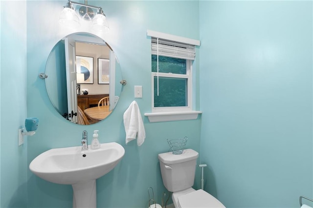13807 W 47th Ter, Shawnee, KS 66216 - half bathroom featuring toilet and a sink