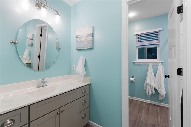 13807 W 47th Ter, Shawnee, KS 66216 - bathroom featuring vanity and baseboards