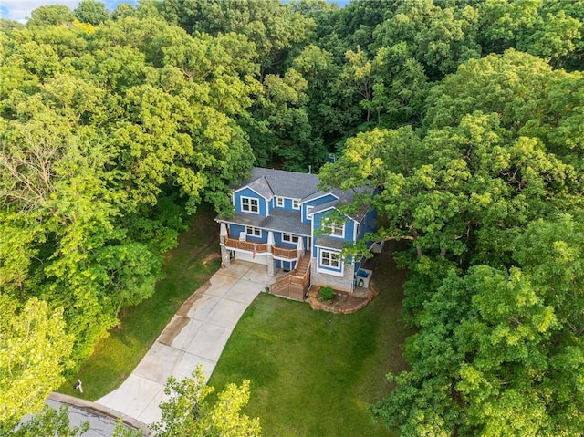 13807 W 47th Ter, Shawnee, KS 66216 - aerial view of property and surrounding area with a forest