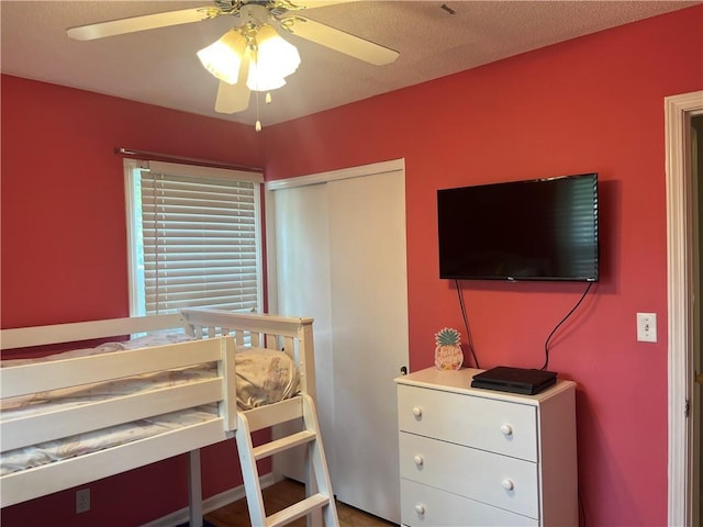 8425 N Tracy Ave, Kansas City, MO 64155 - bedroom with a closet and a ceiling fan