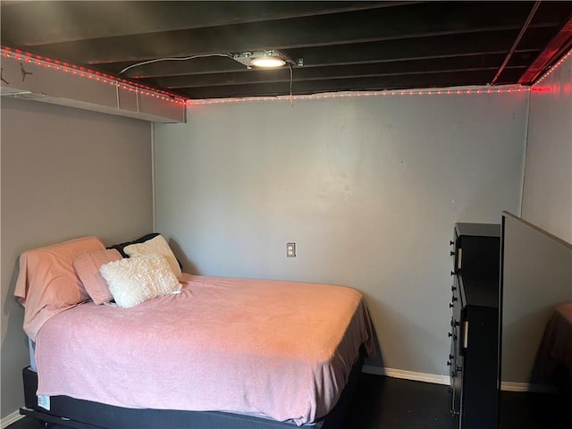 8425 N Tracy Ave, Kansas City, MO 64155 - bedroom featuring baseboards