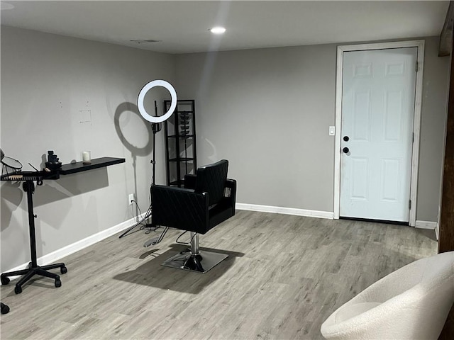 8425 N Tracy Ave, Kansas City, MO 64155 - misc room with wood finished floors, baseboards, and recessed lighting
