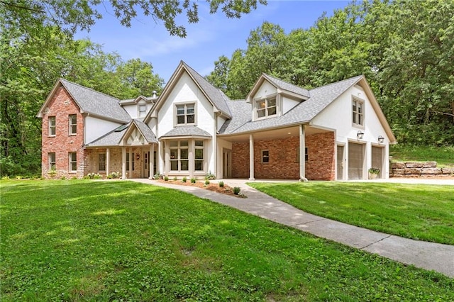 1810 S 98th St, Edwardsville, KS 66111 - view of front of house with brick siding and a front lawn