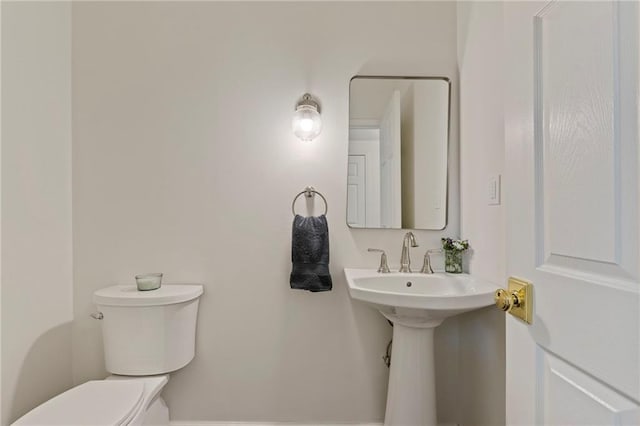1810 S 98th St, Edwardsville, KS 66111 - half bathroom with toilet and a sink
