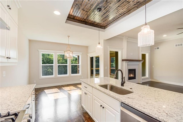 22900 S Ridgeview Dr, Peculiar, MO 64078 - kitchen with a sink, dark wood-type flooring, light stone counters, white cabinets, and recessed lighting