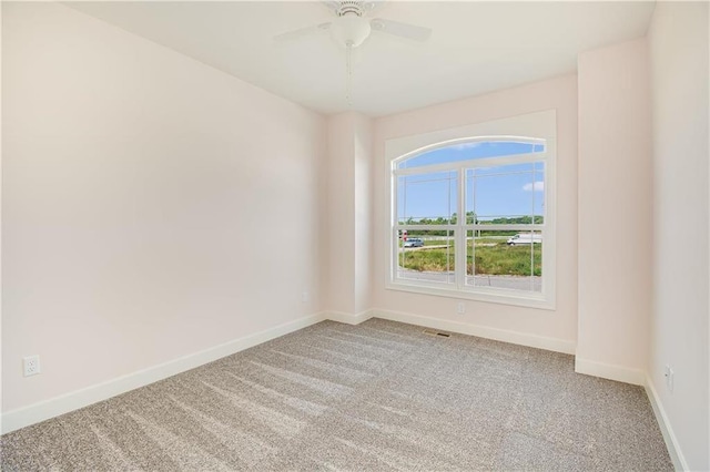 22900 S Ridgeview Dr, Peculiar, MO 64078 - unfurnished room with carpet flooring, baseboards, and ceiling fan