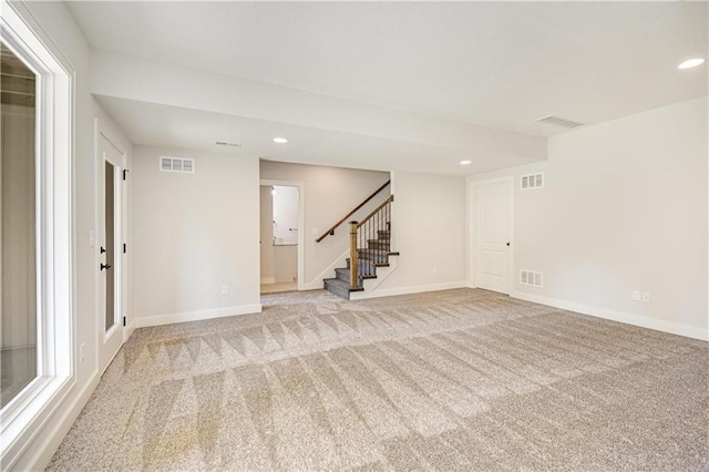 22900 S Ridgeview Dr, Peculiar, MO 64078 - unfurnished room with stairs, light colored carpet, recessed lighting, and baseboards