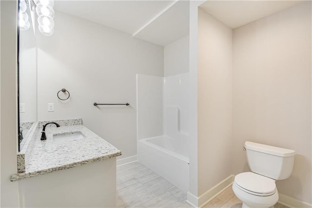22900 S Ridgeview Dr, Peculiar, MO 64078 - full bath featuring toilet, vanity, baseboards, shower / washtub combination, and wood finished floors