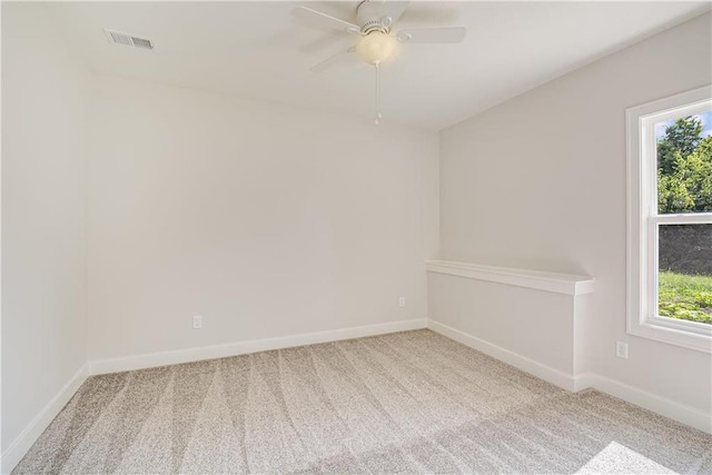 22900 S Ridgeview Dr, Peculiar, MO 64078 - carpeted empty room with plenty of natural light, ceiling fan, and baseboards