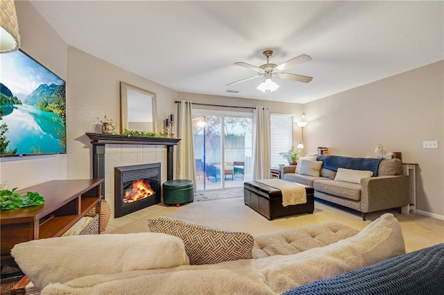 3222 SW Shadow Brook Dr, Blue Springs, MO 64015 - living room with a tile fireplace and a ceiling fan