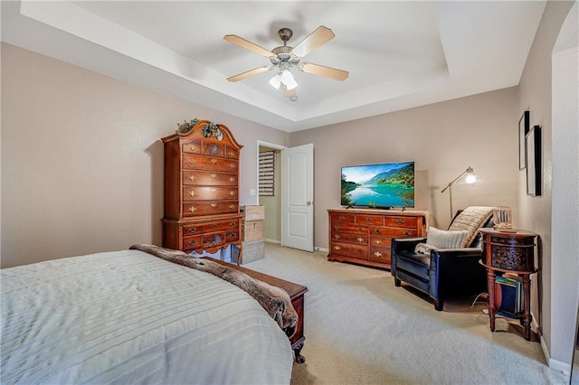 3222 SW Shadow Brook Dr, Blue Springs, MO 64015 - bedroom featuring light colored carpet, a raised ceiling, and ceiling fan