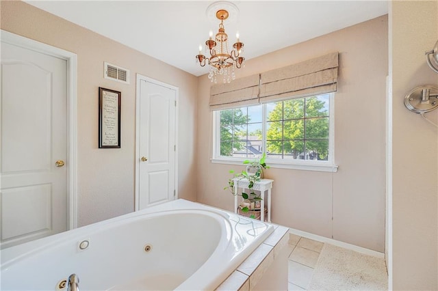 3222 SW Shadow Brook Dr, Blue Springs, MO 64015 - bathroom featuring a tub with jets, a chandelier, and tile patterned floors