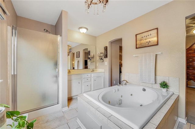 3222 SW Shadow Brook Dr, Blue Springs, MO 64015 - bathroom featuring a shower stall, a tub with jets, double vanity, and tile patterned flooring