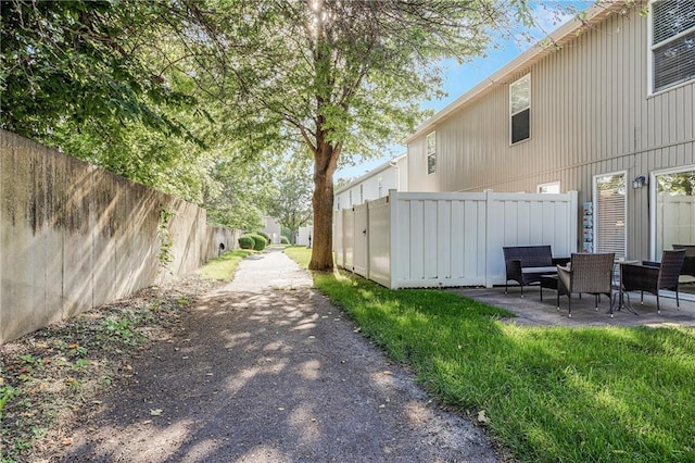 3222 SW Shadow Brook Dr, Blue Springs, MO 64015 - view of yard featuring a patio area
