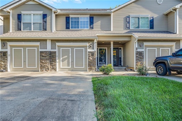 3222 SW Shadow Brook Dr, Blue Springs, MO 64015 - view of front of house featuring stone siding, roof with shingles, and a front lawn