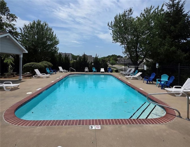 3222 SW Shadow Brook Dr, Blue Springs, MO 64015 - community pool with a patio