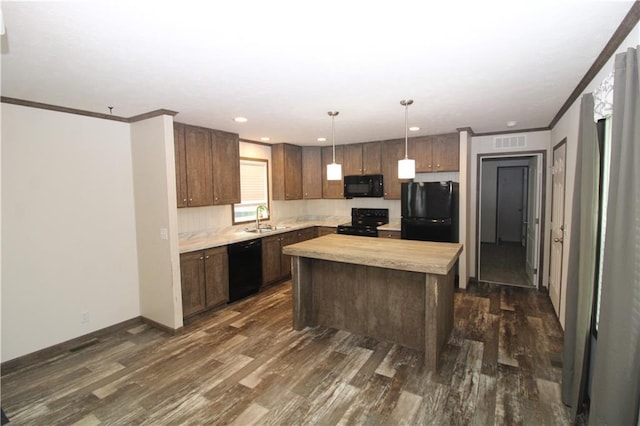 17922 County Road 361, Savannah, MO 64485 - kitchen featuring black appliances, a sink, light countertops, dark wood-style flooring, and ornamental molding