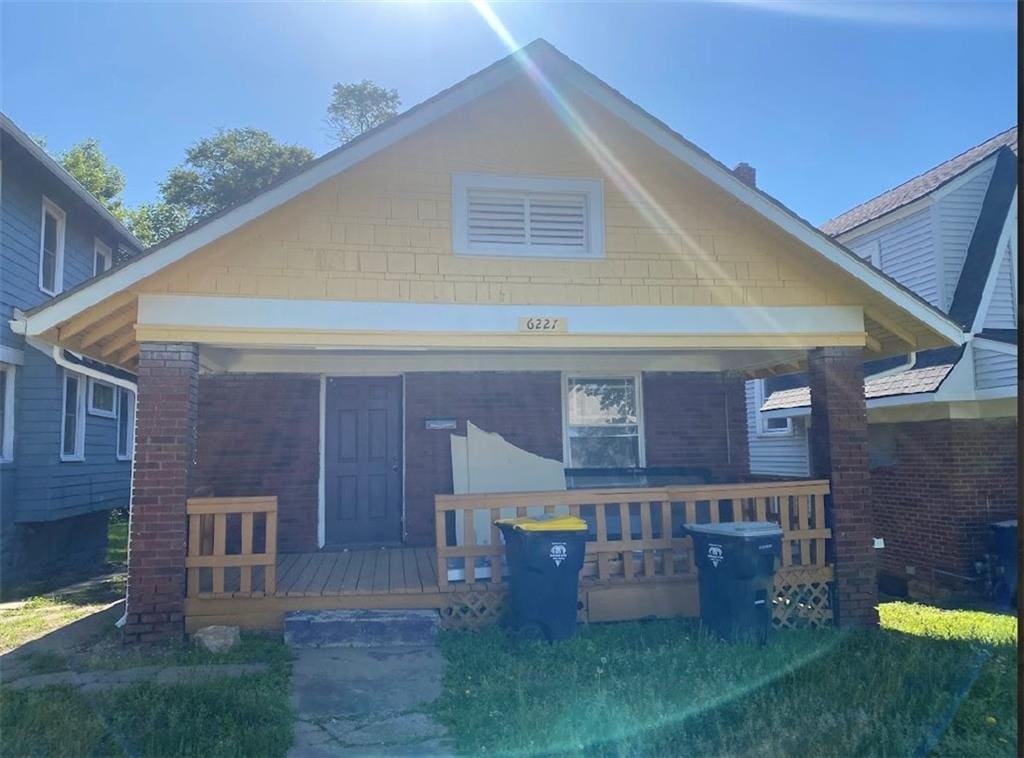 6227 Forest Ave, Kansas City, MO 64110 - view of front of house featuring covered porch