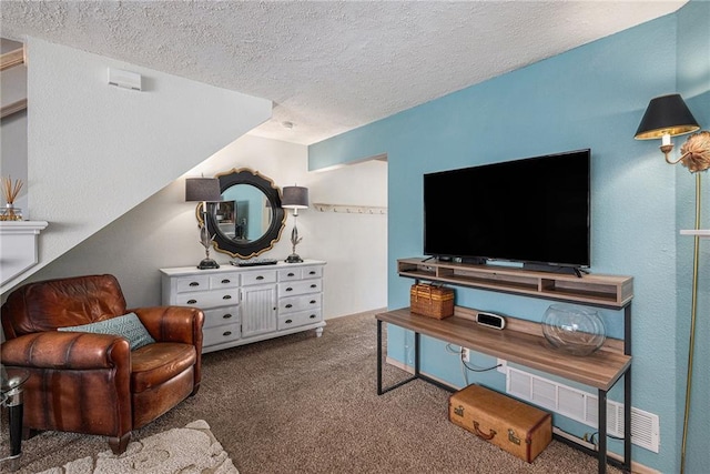 1404 SE Lexington Ave, Lees Summit, MO 64081 - living room featuring carpet and a textured ceiling