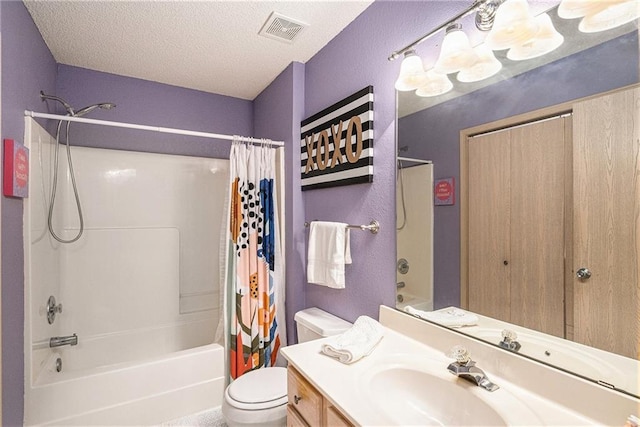 1404 SE Lexington Ave, Lees Summit, MO 64081 - full bathroom featuring shower / bath combo, vanity, toilet, and a textured ceiling