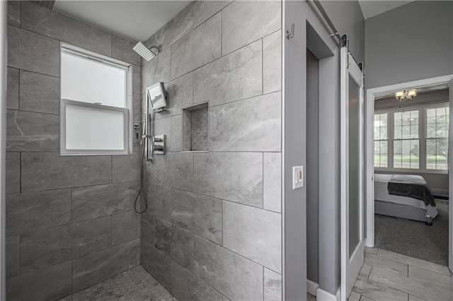 11702 E 246th St, Peculiar, MO 64078 - full bathroom featuring a tile shower, ensuite bathroom, and marble look tiles