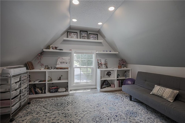 11702 E 246th St, Peculiar, MO 64078 - interior space with a textured ceiling, lofted ceiling, recessed lighting, and wood finished floors