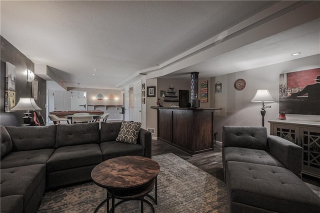 11702 E 246th St, Peculiar, MO 64078 - living area with a dry bar, billiards table, dark wood-style floors, a textured ceiling, and recessed lighting