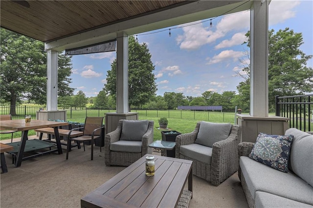 11702 E 246th St, Peculiar, MO 64078 - fenced backyard with outdoor dining area, outdoor lounge area, and a patio