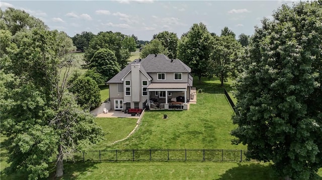 11702 E 246th St, Peculiar, MO 64078 - back of house with a patio, french doors, stucco siding, and a fenced backyard
