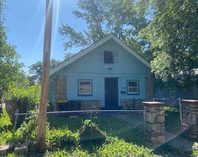 8201 Lydia Ave, Kansas City, MO 64131 - bungalow-style home with stone siding