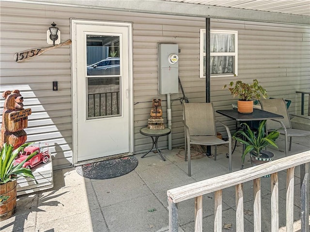15157 Bass Cove Rd, Gravois Mills, MO 65037 - doorway to property with a patio area