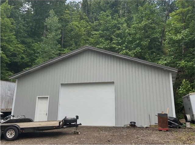 15157 Bass Cove Rd, Gravois Mills, MO 65037 - detached garage with a view of trees