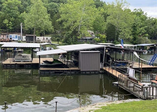 15157 Bass Cove Rd, Gravois Mills, MO 65037 - dock area with boat lift and a water view