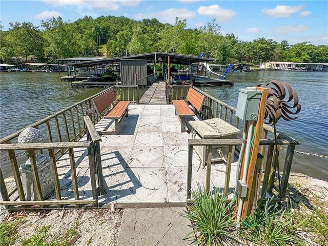 15157 Bass Cove Rd, Gravois Mills, MO 65037 - dock area featuring a water view, a wooded view, and boat lift