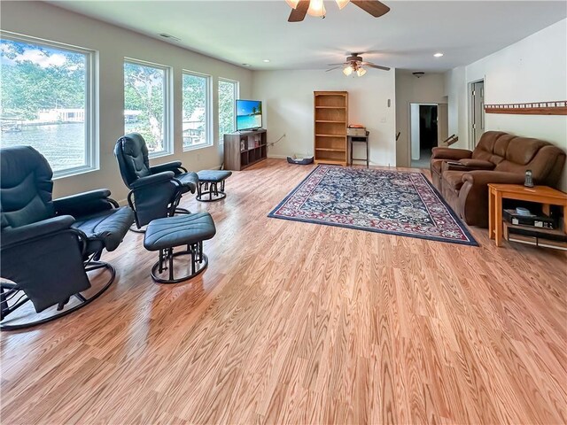 15157 Bass Cove Rd, Gravois Mills, MO 65037 - living area featuring ceiling fan, wood finished floors, recessed lighting, and baseboards