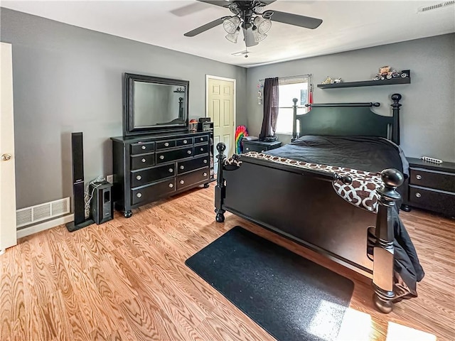15157 Bass Cove Rd, Gravois Mills, MO 65037 - bedroom with wood finished floors and ceiling fan