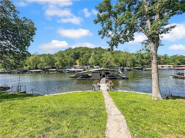 15157 Bass Cove Rd, Gravois Mills, MO 65037 - dock area featuring a yard, a water view, and a forest view