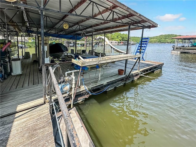 15157 Bass Cove Rd, Gravois Mills, MO 65037 - dock area with boat lift and a water view