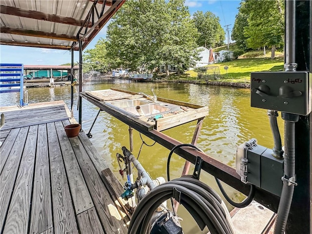15157 Bass Cove Rd, Gravois Mills, MO 65037 - dock area with a water view and a lawn