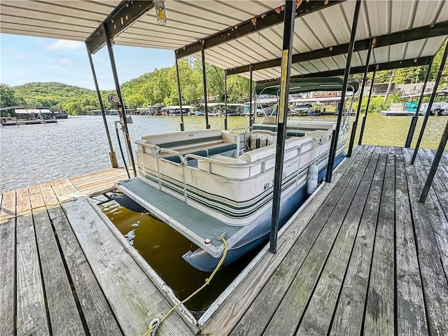 15157 Bass Cove Rd, Gravois Mills, MO 65037 - dock area featuring a water view and boat lift