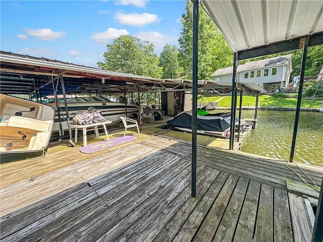 15157 Bass Cove Rd, Gravois Mills, MO 65037 - dock area featuring boat lift and a water view